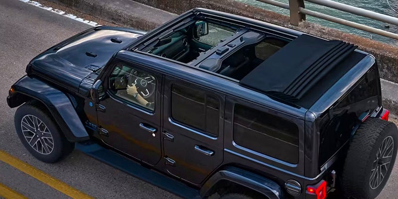 4 door Jeep Wrangler with an open top
